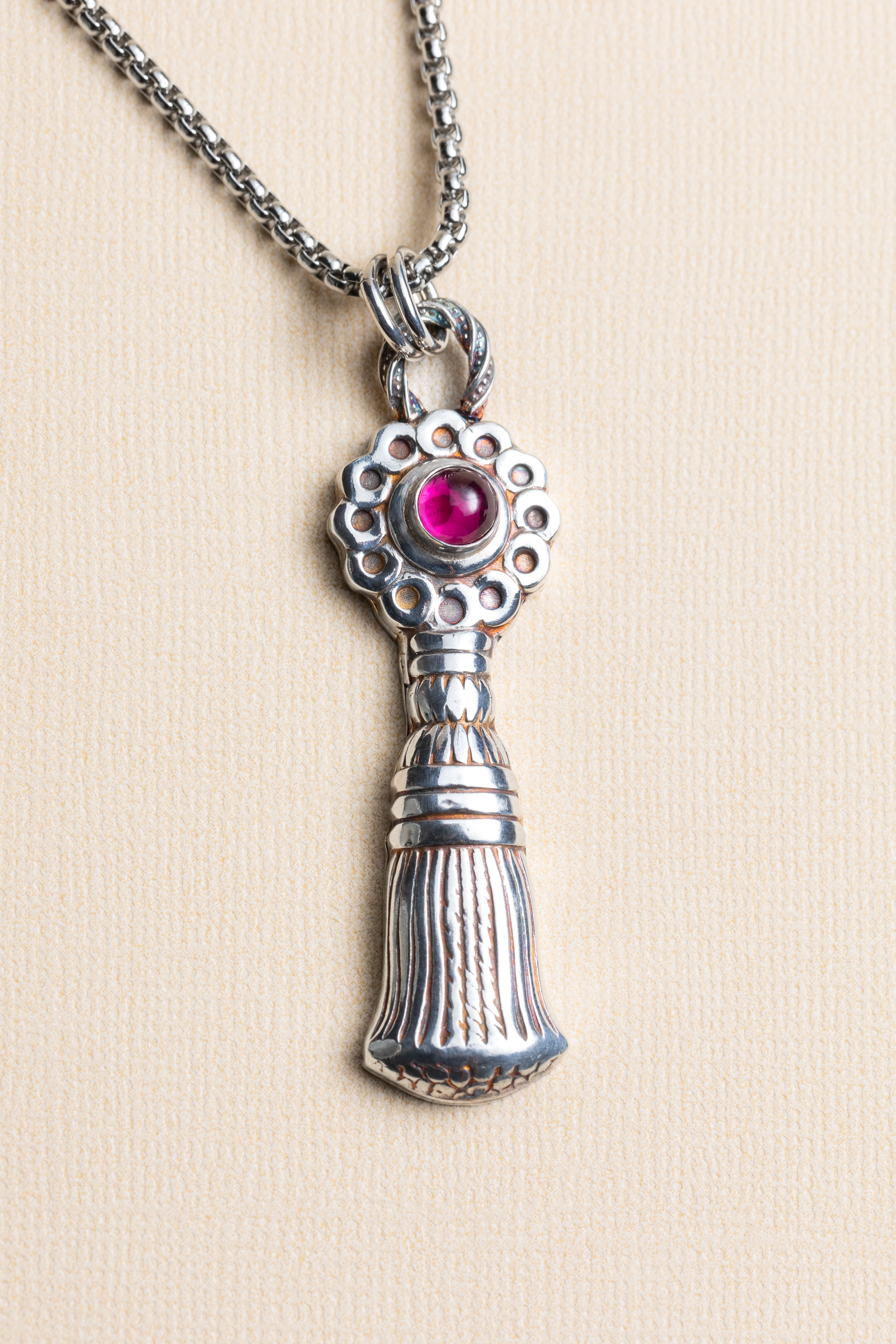 Silver Tassel with Ruby